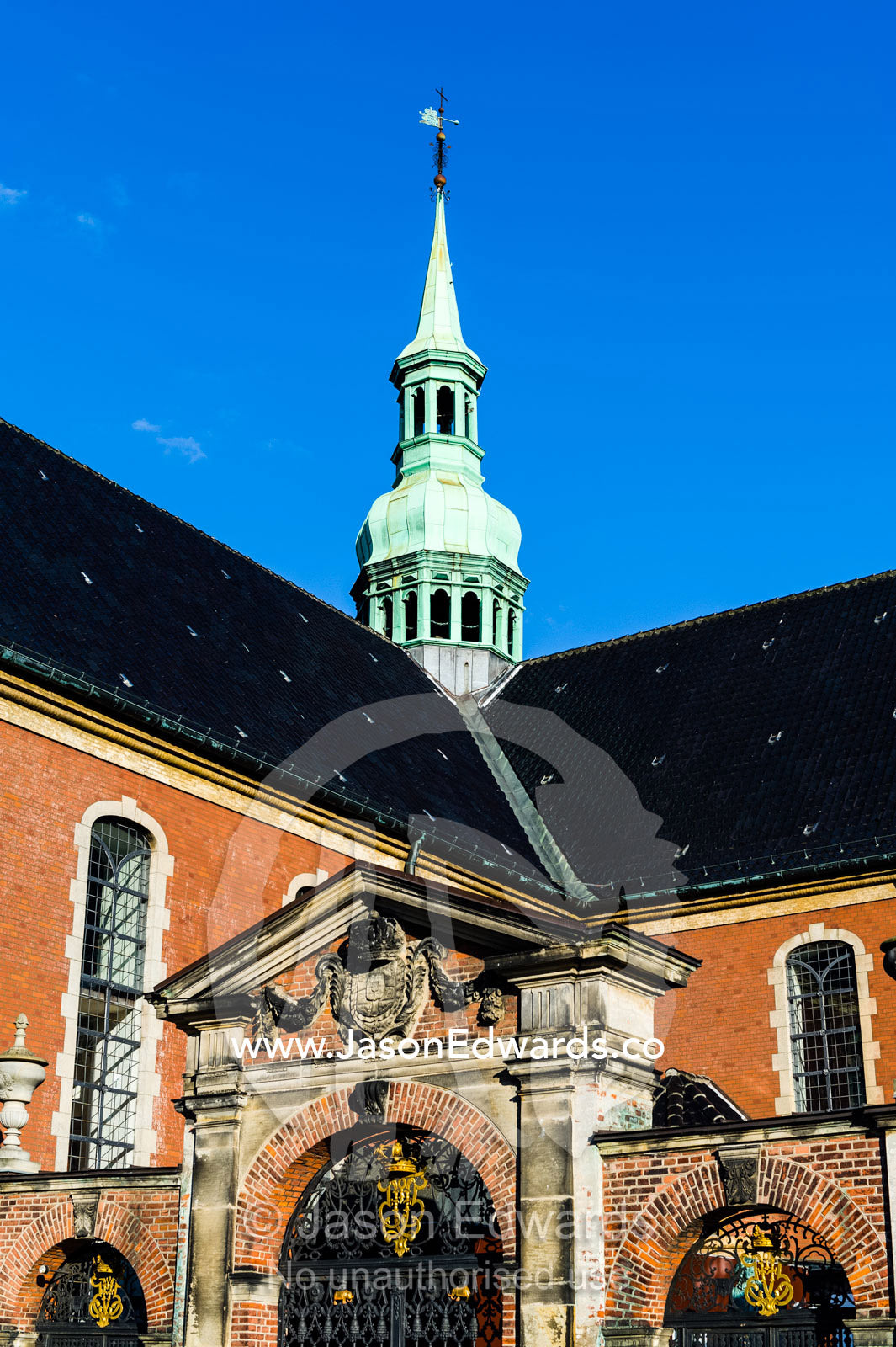 The spire of the Holmen Church overlooking a canal in Copenhagen. Holmen Church, Copenhagen, Denmark.