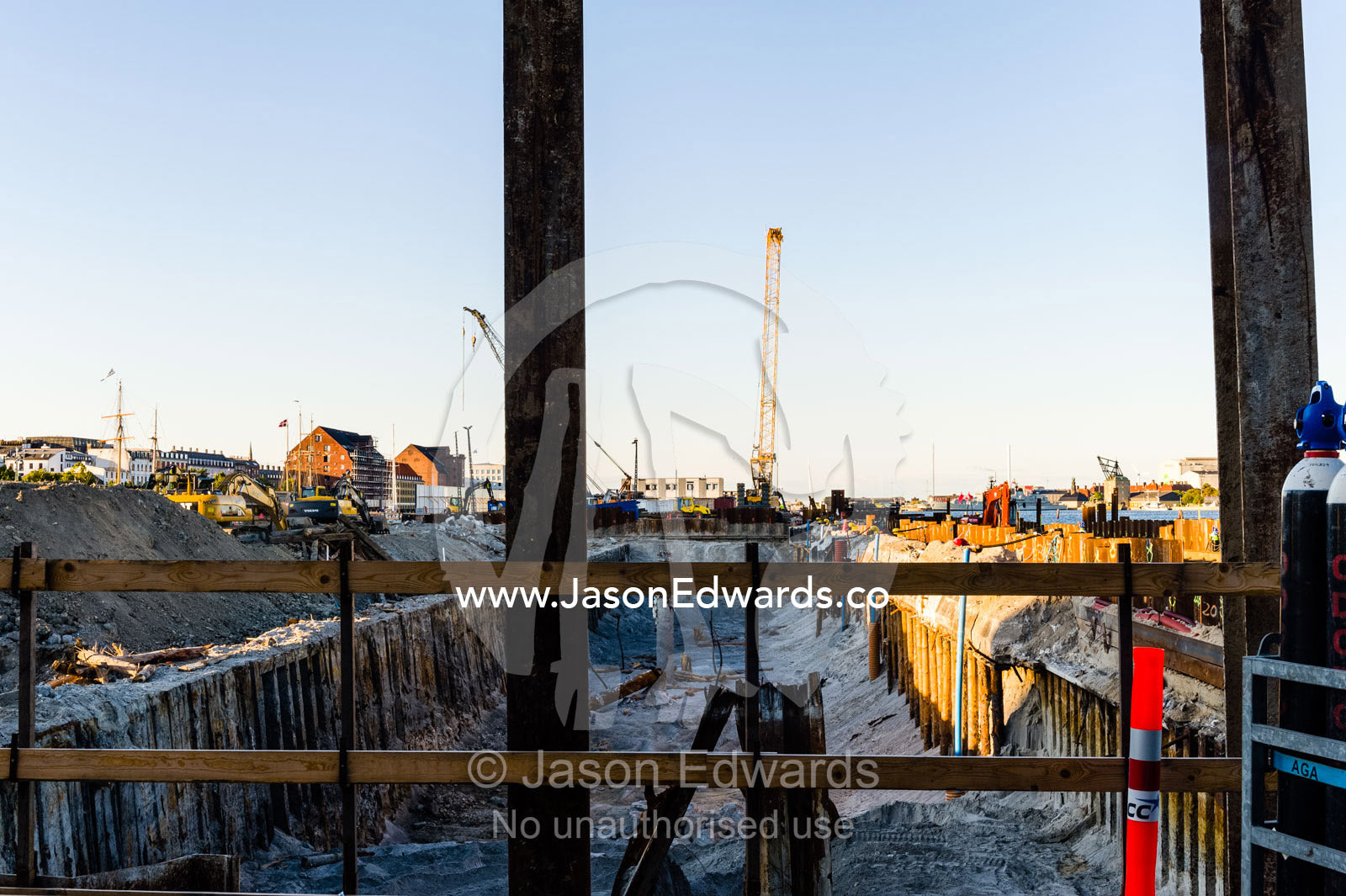 A dike and retaining wall being drained of water for land reclamation. Holmen, Copenhagen, Denmark.