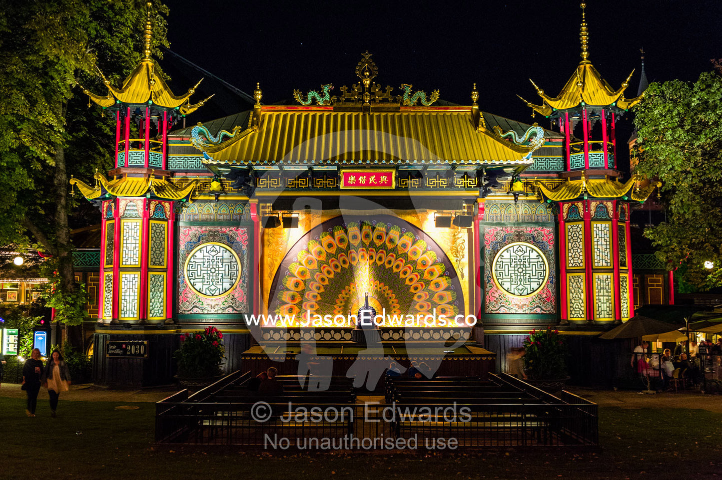 The colourful facade of the Oriental Palace illuminated at night. Oriental Palace, Tivoli Gardens, Copenhagen, Denmark.