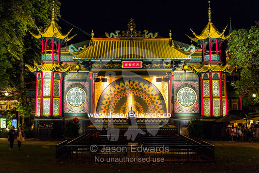 The colourful facade of the Oriental Palace illuminated at night. Oriental Palace, Tivoli Gardens, Copenhagen, Denmark.