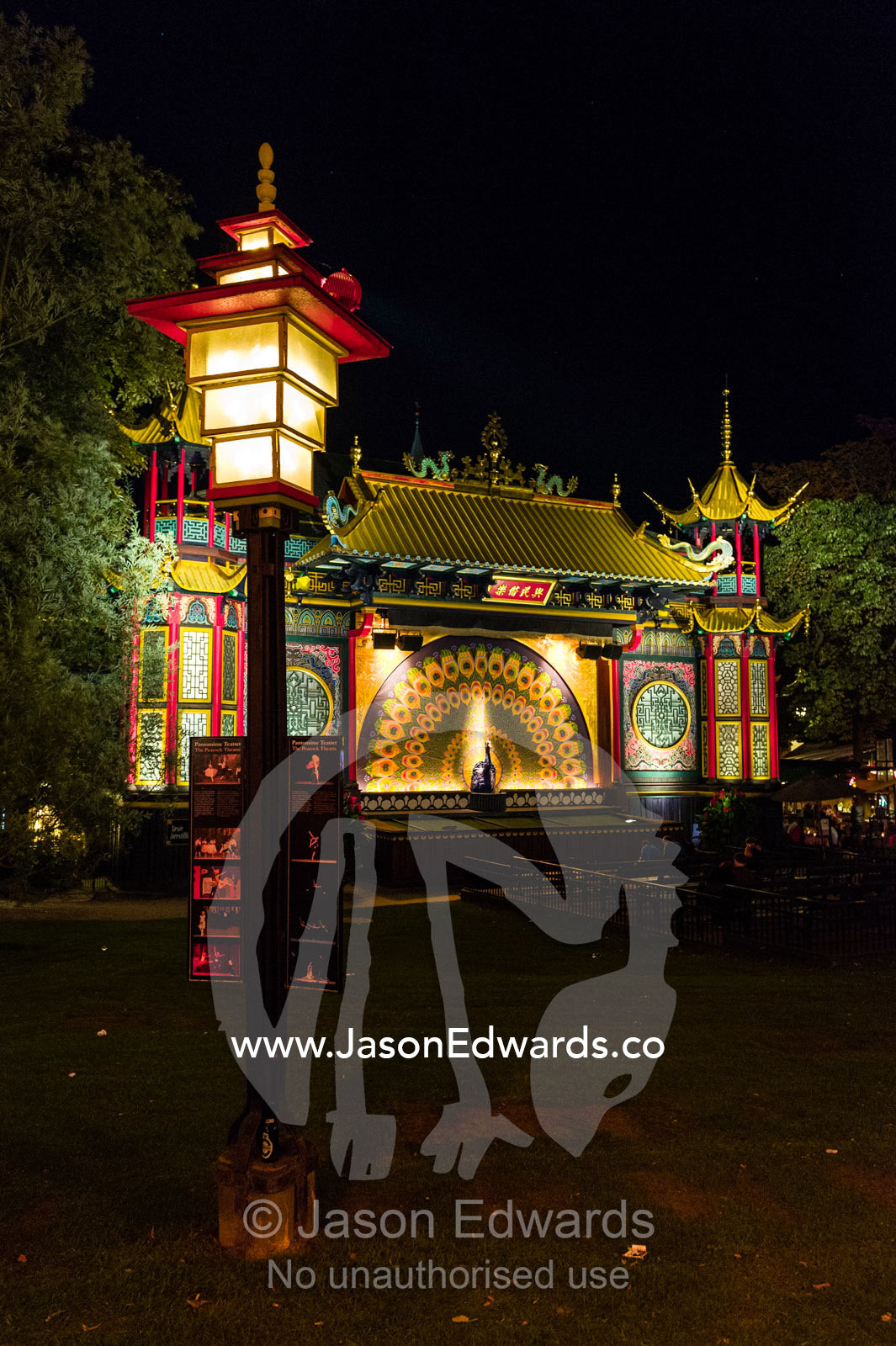 The colourful facade of the Oriental Palace illuminated at night. Oriental Palace, Tivoli Gardens, Copenhagen, Denmark.