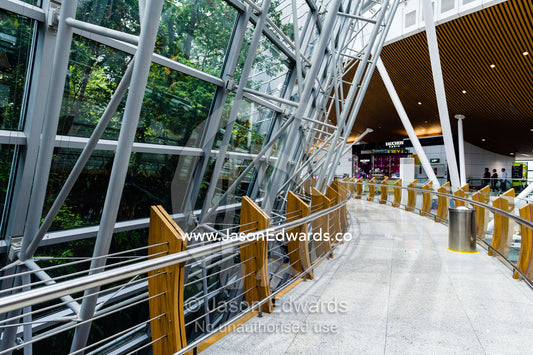 The steel and glass facade of the rainforest botanical garden at Kuala Lumpur International airport. Kuala Lumpur International Airport, Malaysia,