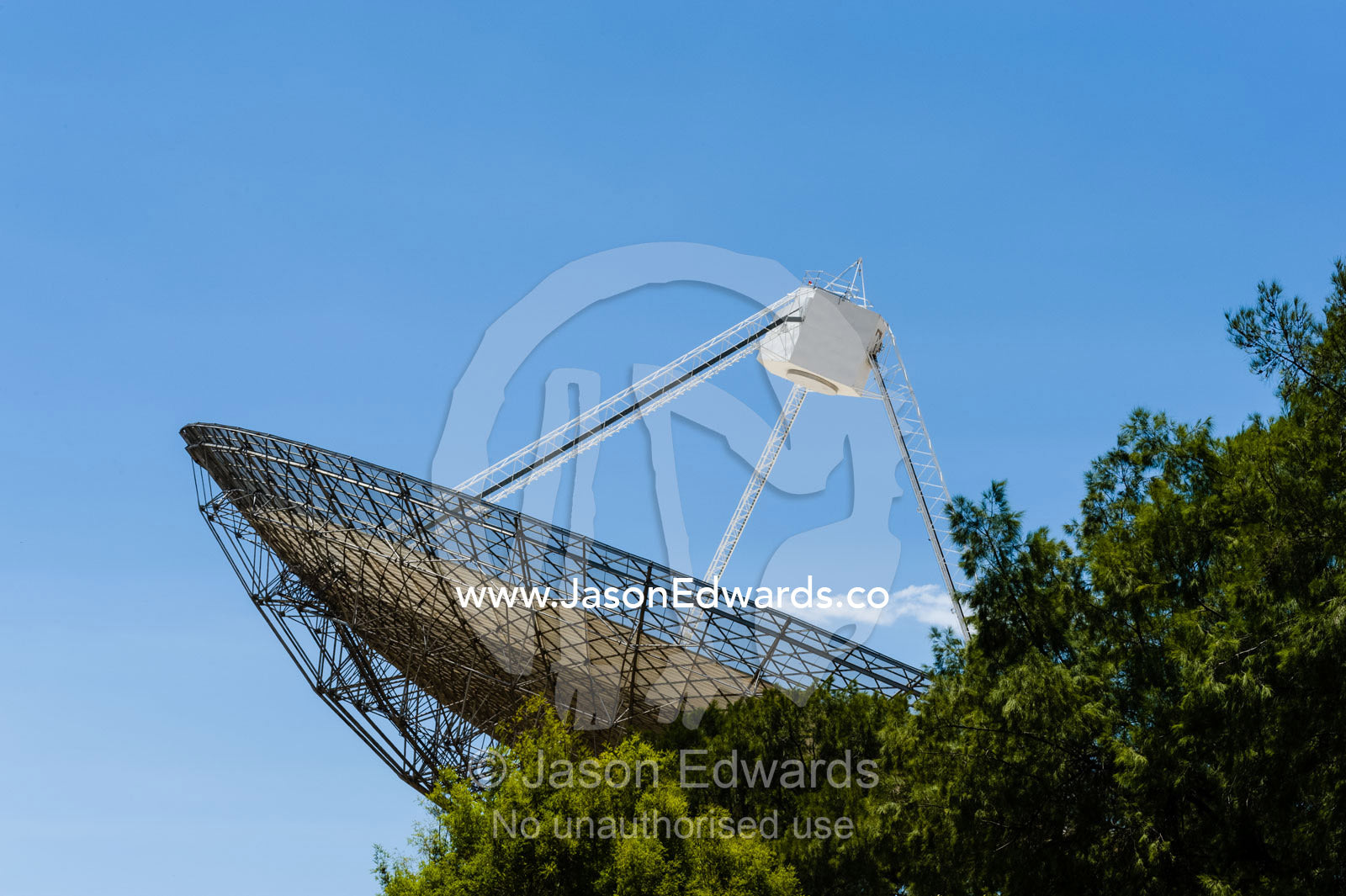 The receiving cabin above the parabolic dish of a radio telescope containing radio and microwave detectors. CSIRO, Parkes Observatory, Australia National Telescope Facility, Parkes, New South Wales, Australia.