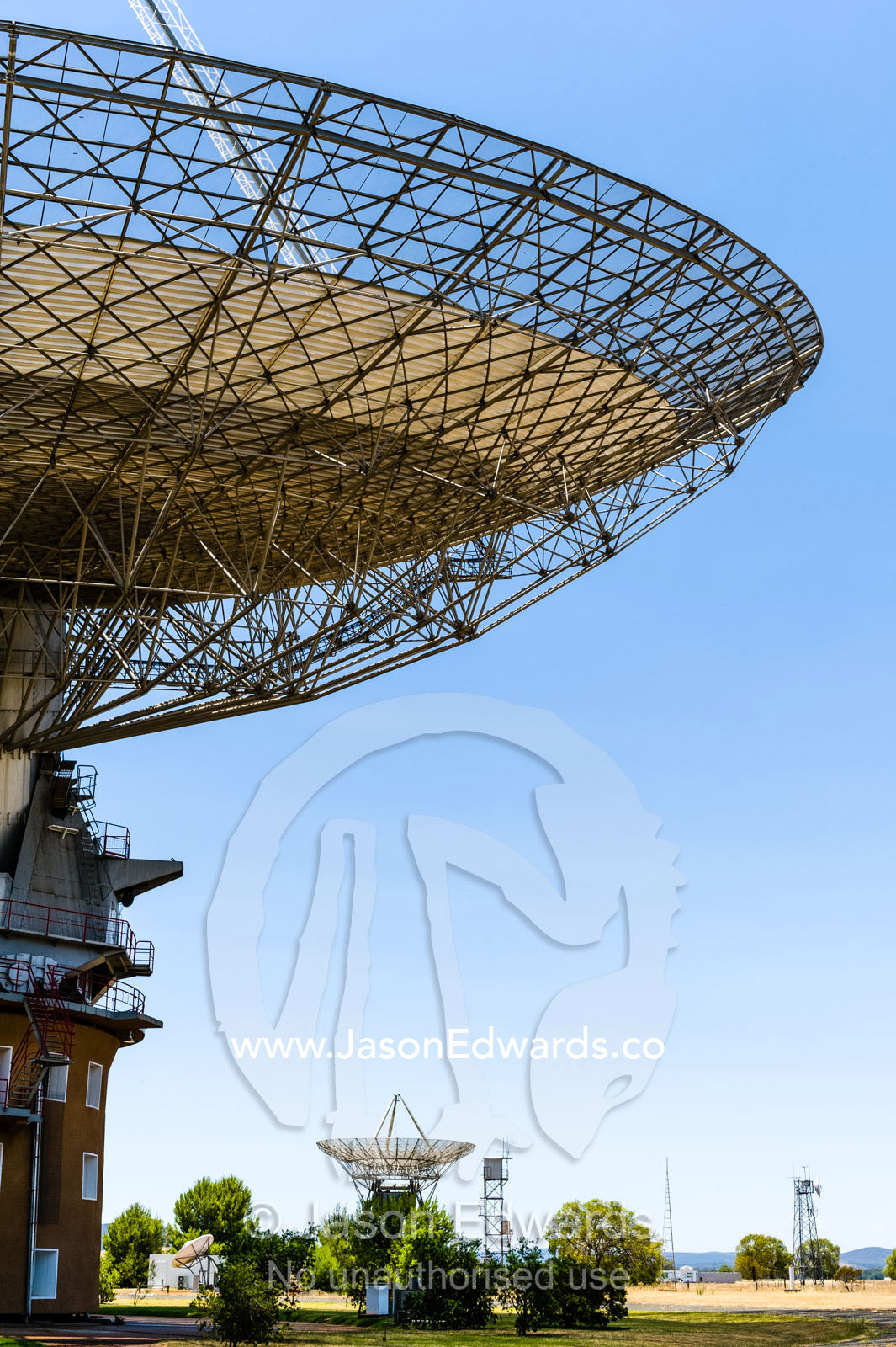 The receiving cabin above the parabolic dish of a radio telescope containing radio and microwave detectors. CSIRO, Parkes Observatory, Australia National Telescope Facility, Parkes, New South Wales, Australia.