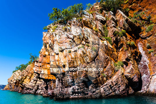 A series of sandstone synclines where folds in the rock happen under pressure. Nares Point, Cockatoo Island, Yampi Sound, Buccaneer Archipelago, Kimberley Coast, Western Australia, Australia.