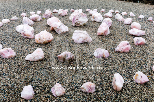 A spiral of rose quartz crystals in a botanical garden. Crystal Castle, Shambhala Gardens, Mullumbimby, New South Wales, Australia.