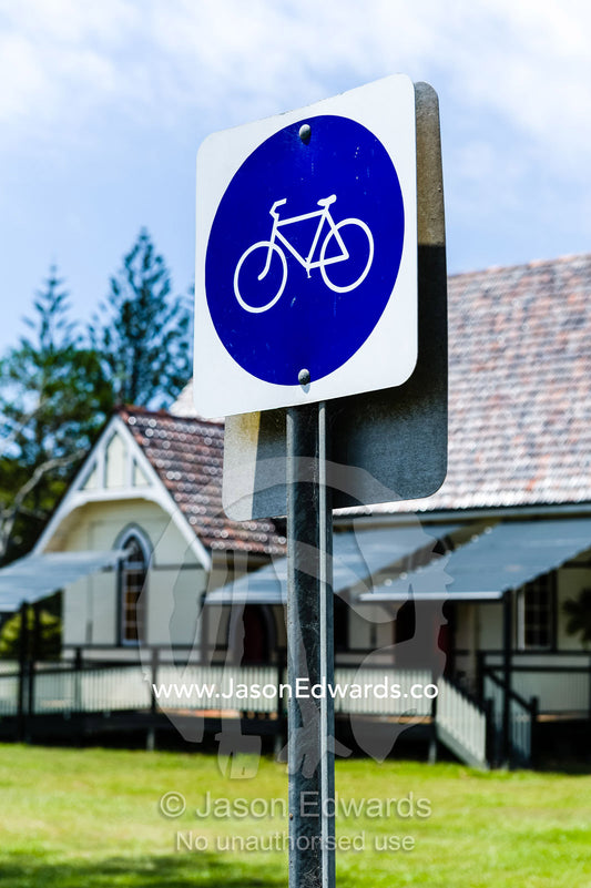 A cycling path sign in a small coastal town. Ulmarra, New South Wales, Australia.