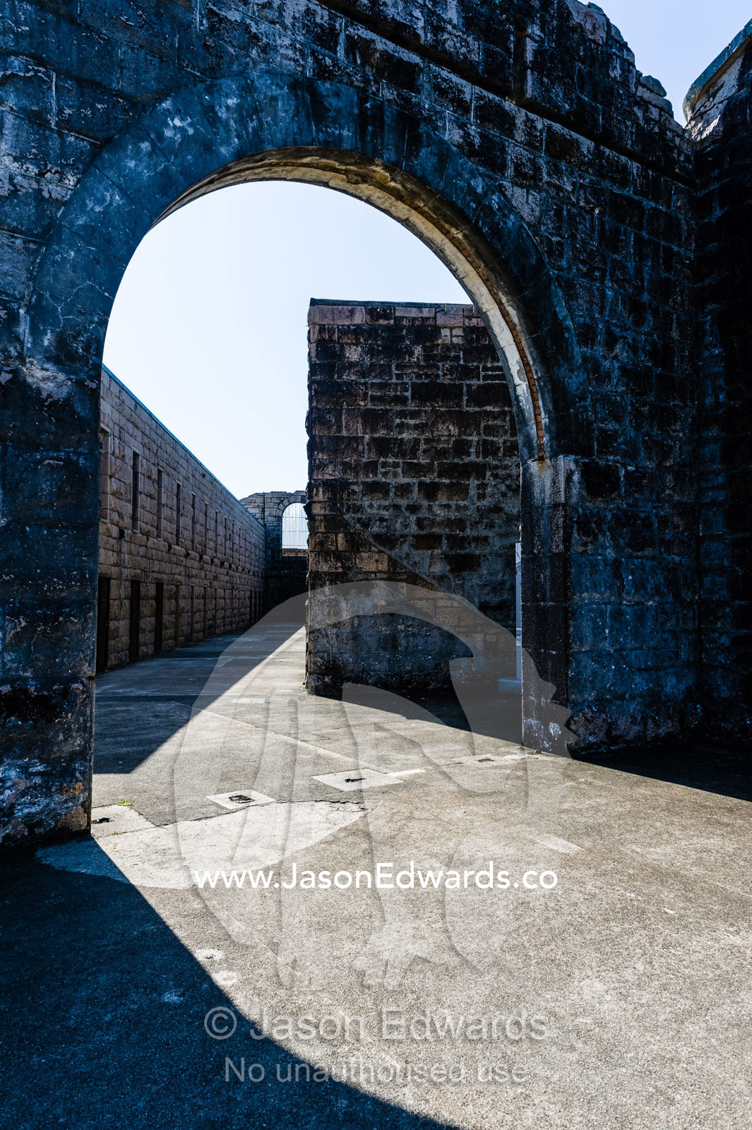 A limestone archway in an abbey in an antique prison. Trial Bay Goal, Laggers Point, Arakoon National Park, New South Wales, Australia.