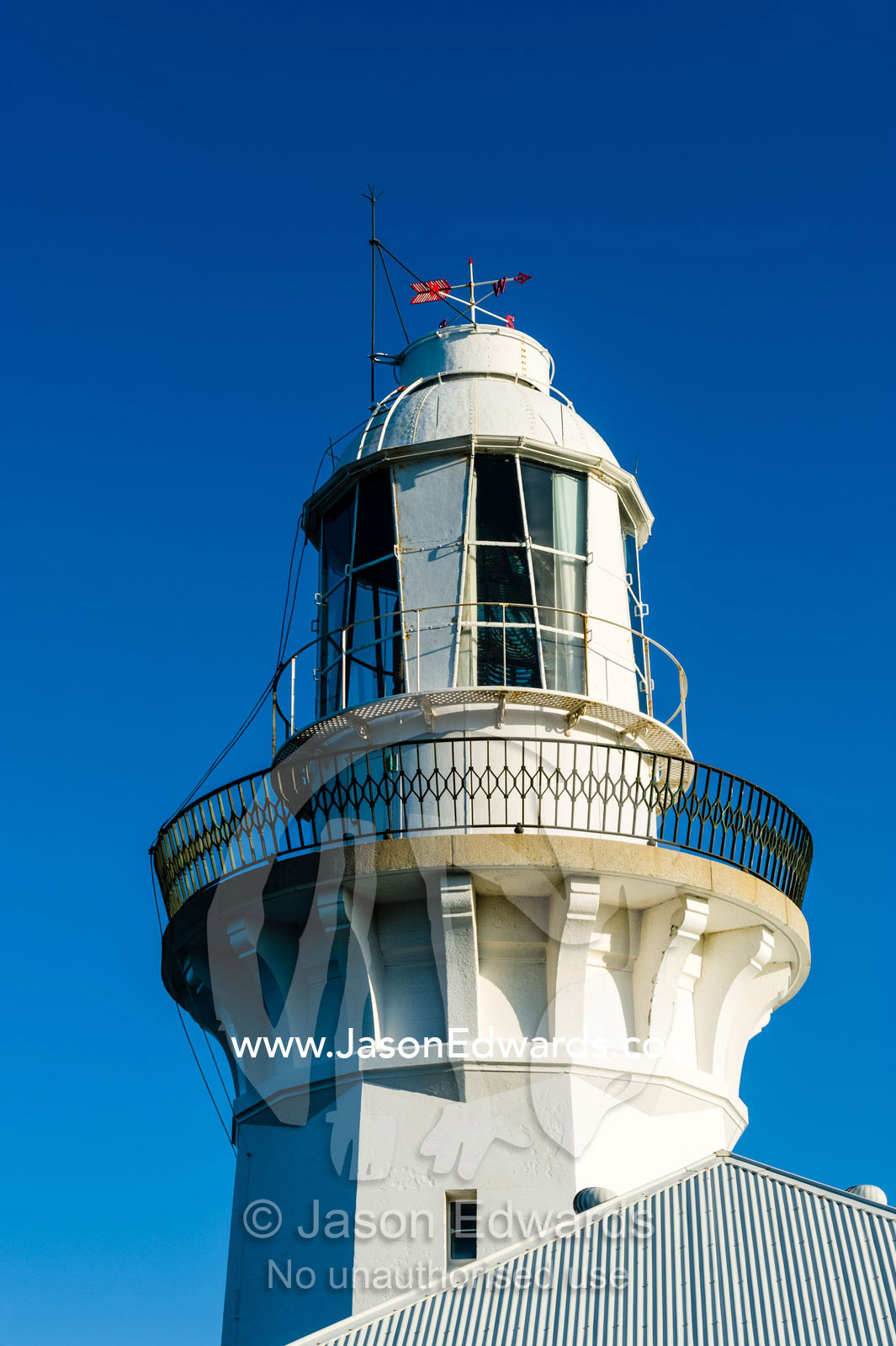 The lantern room, widows walk and cupola of a lighthouse. Smoky Cape Lighthouse, Hat Head National Park, New South Wales, Australia.
