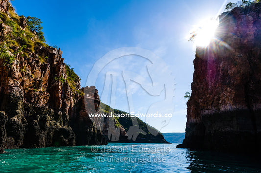 The silhouette of a fast moving tidal flow through a narrow gorge. Horizontal Falls, McLarty Range, Talbot Bay, Kimberley Coast, Western Australia, Australia.