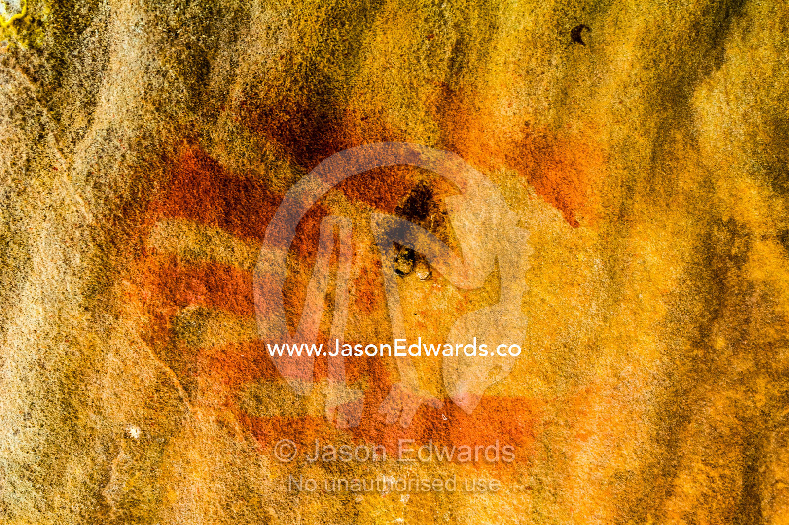 An ancient Wandjina hand stencil on the wall of a cave. Raft Point, Doubtful Bay, Buccaneer Archipelago, Kimberley Coast, Western Australia, Australia.