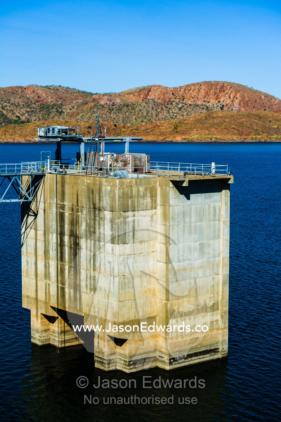 A dam intake tower on the Lake Argyle dam wall. Ord River Dam, Lake Argyle, Kimberley Coast, Western Australia, Australia.