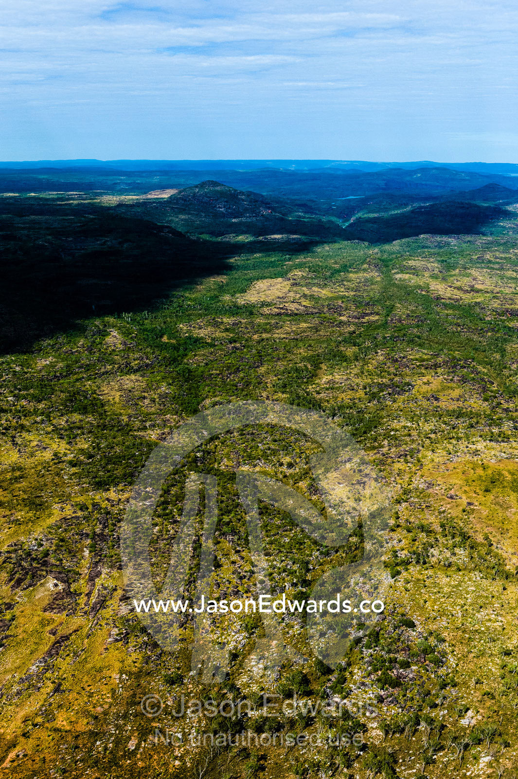 An aerial view of the harsh rocky surface of an arid plateau on the Kimberley coastline. Mitchell River National Park, Mitchell Plateau, Kimberley Coast, Western Australia, Australia.