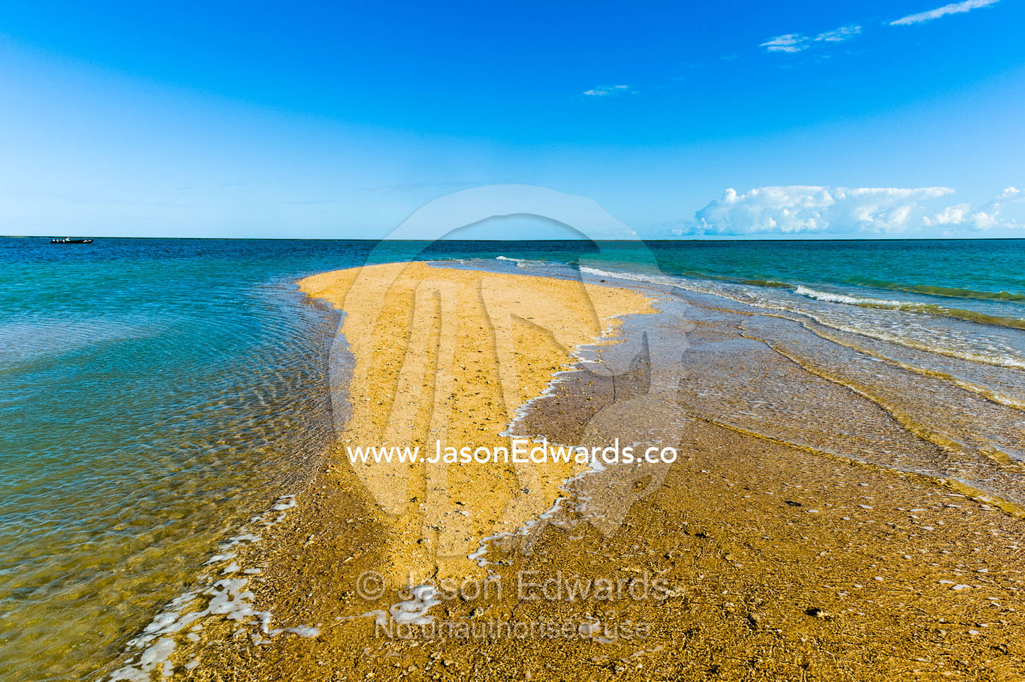 The rising tide swallows a small sand island. Montgomery Reef, Camden Sound, Kimberley Coast, Western Australia, Australia.