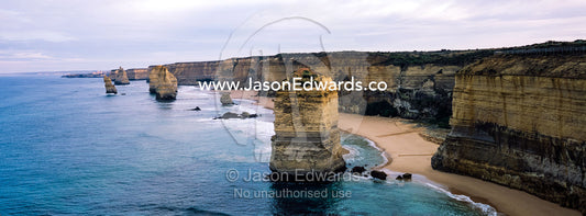 An aerial view of the sheer limestone cliffs and the Twelve Apostles pillars. Twelve Apostles, Port Campbell National, Great Ocean Road, Victoria, Australia.