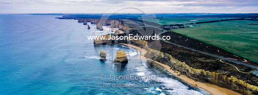 An aerial view of the sheer limestone cliffs and the Twelve Apostles pillars. Twelve Apostles, Port Campbell National, Great Ocean Road, Victoria, Australia.