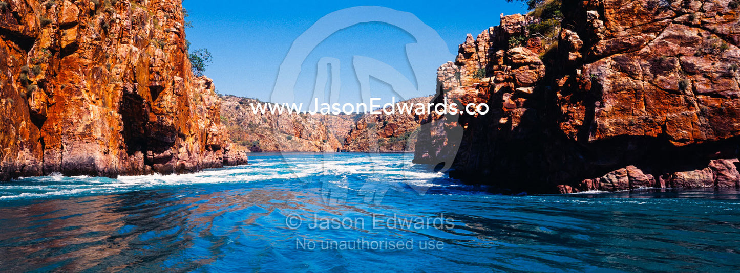 As the tides rises and falls horizontal waterfalls form between gorges in the Kimberley. Horizontal Falls, McLarty Range, Talbot Bay, Buccaneer Archipelago, Kimberley Coast, Western Australia, Australia.