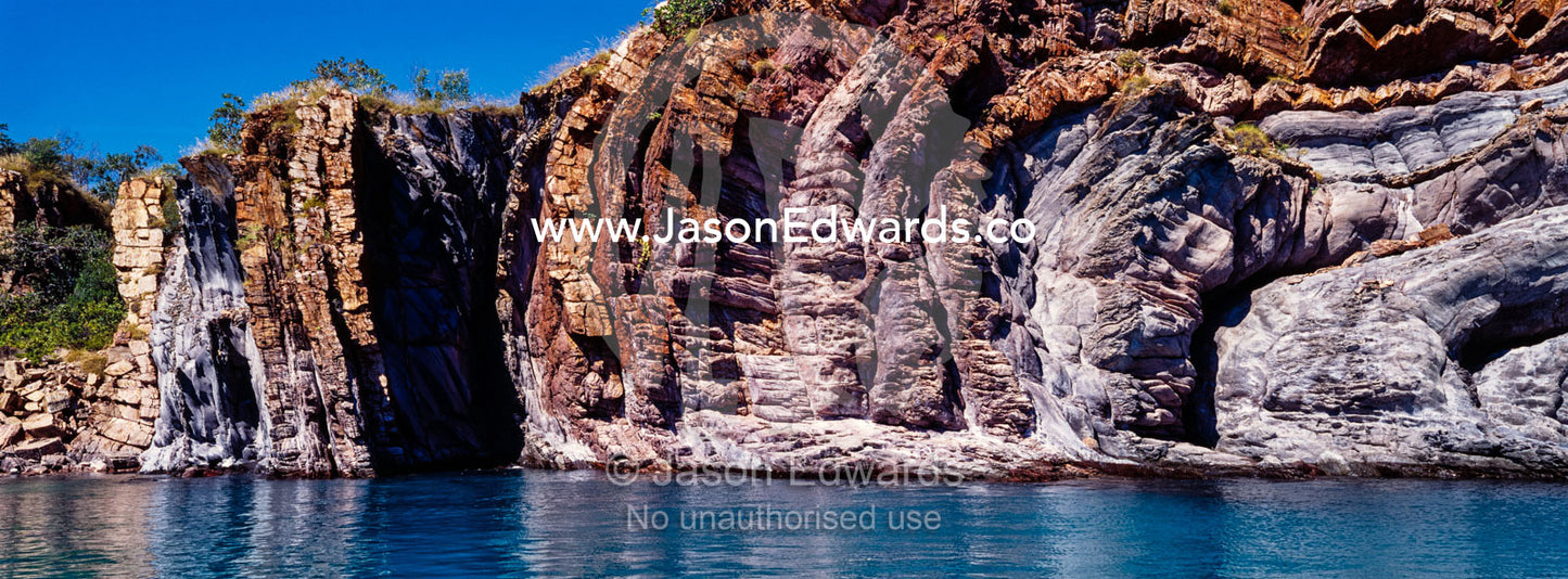 A series of sandstone Anticlines where folds in the rock happen under pressure. Nares Point, Cockatoo Island, Yampi Sound, Kimberley Coast, Western Australia, Australia.