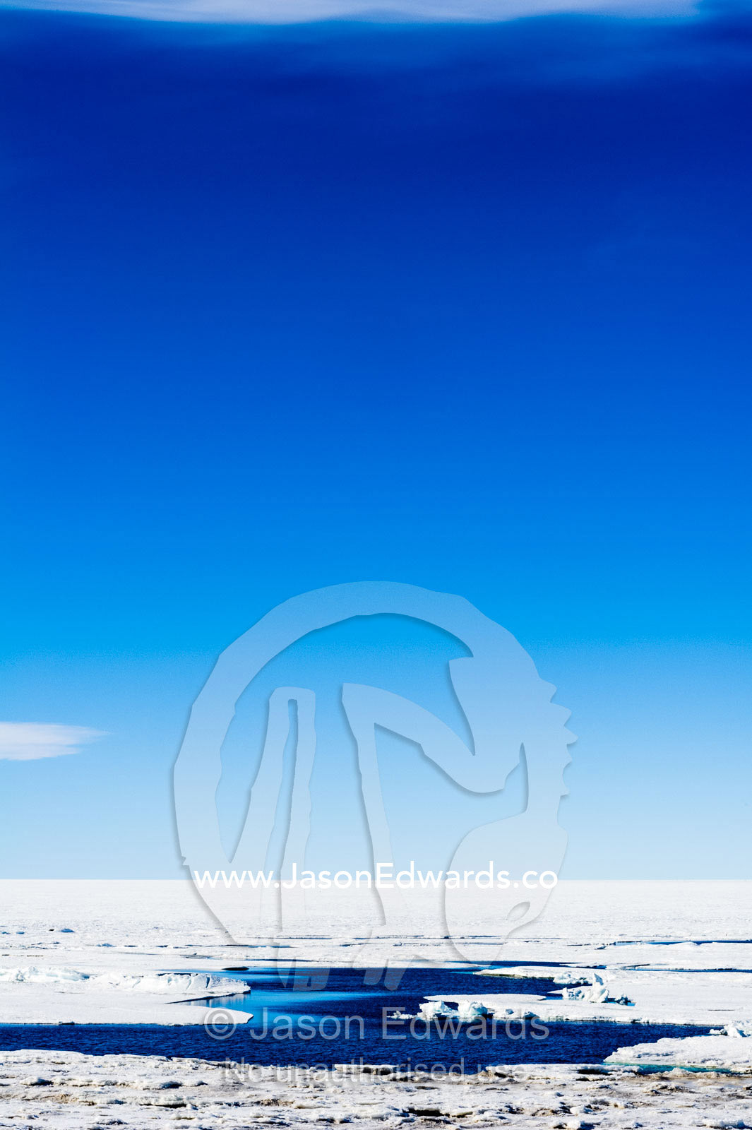 Sea ice breaking open to reveal the ocean beneath. Haskell Strait, McMurdo Sound, Ross Island, Antarctica.
