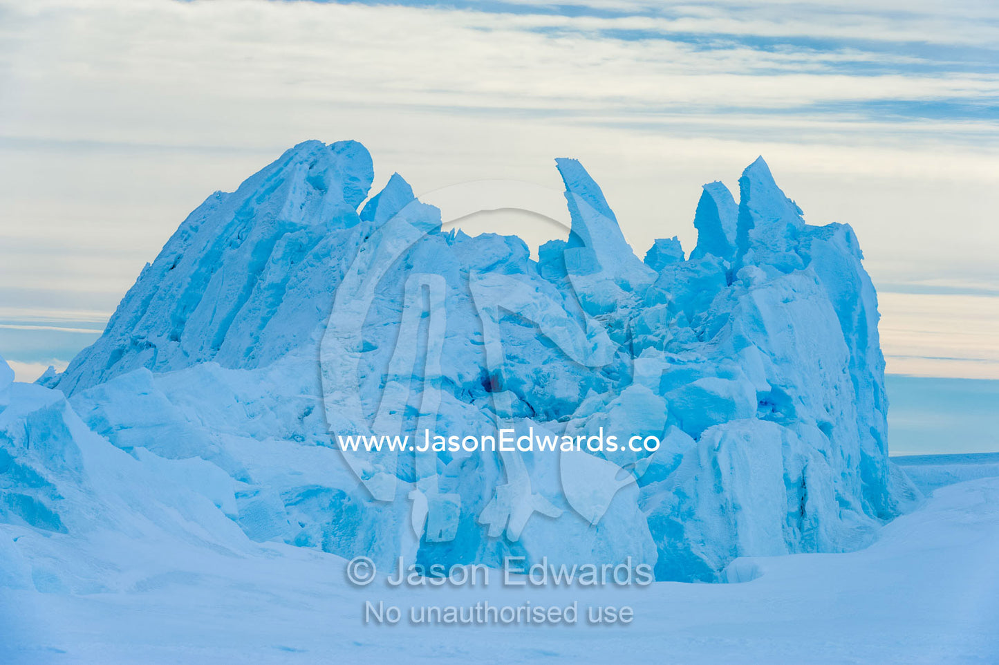 Fractured ice blocks pushed skywards along pressure ridges in the sea ice. Turtle Rock, Erebus Bay, McMurdo Sound, Ross Island, Antarctica.