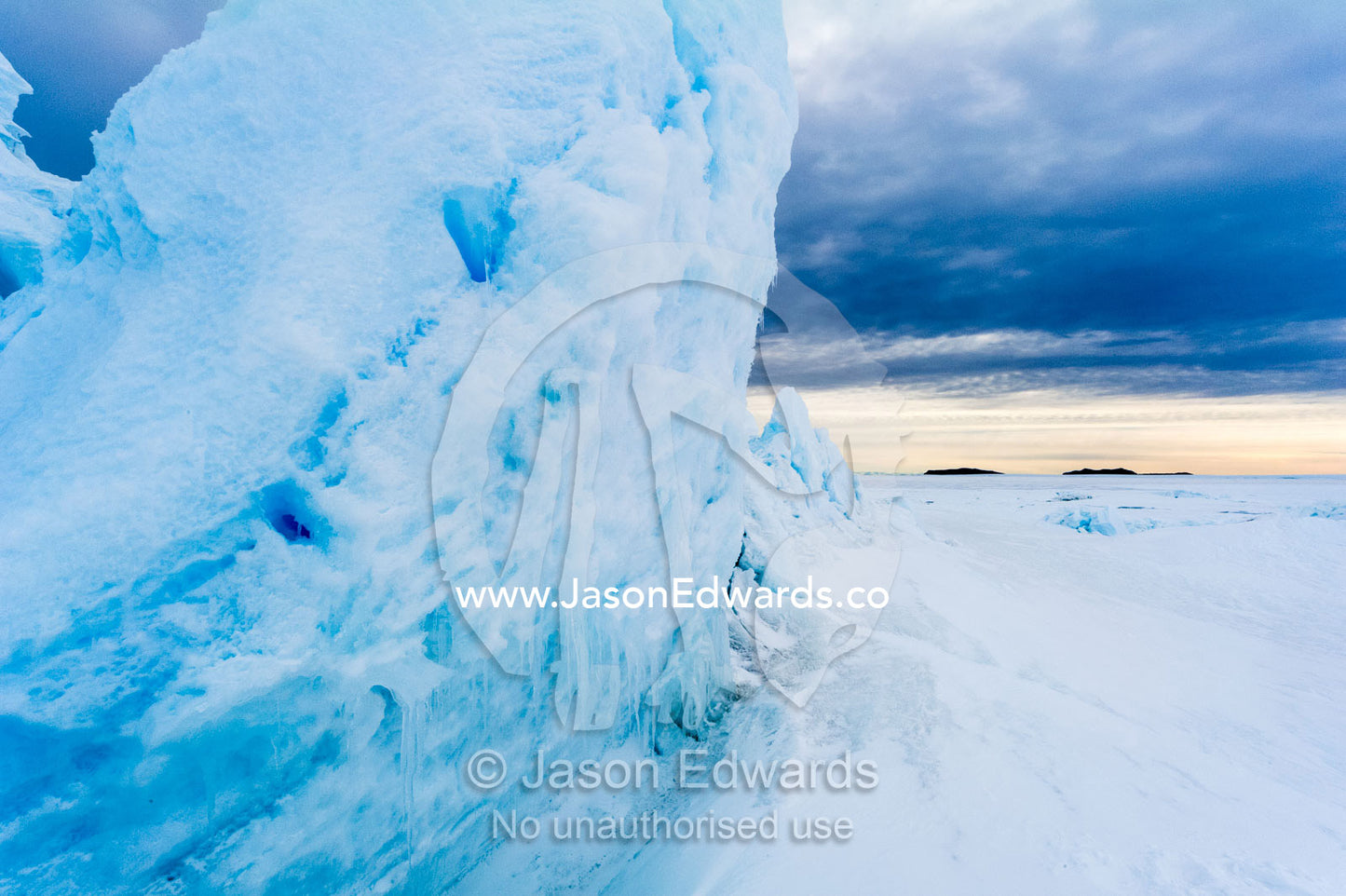 Fractured ice blocks pushed skywards along pressure ridges in the sea ice. Turtle Rock, Erebus Bay, McMurdo Sound, Ross Island, Antarctica.