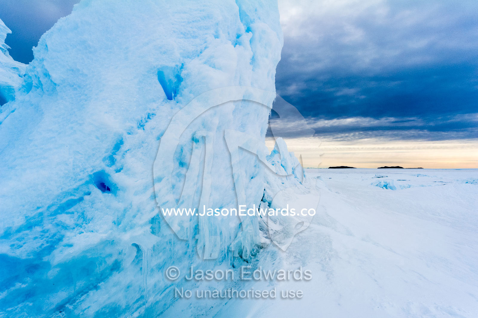Fractured ice blocks pushed skywards along pressure ridges in the sea ice. Turtle Rock, Erebus Bay, McMurdo Sound, Ross Island, Antarctica.