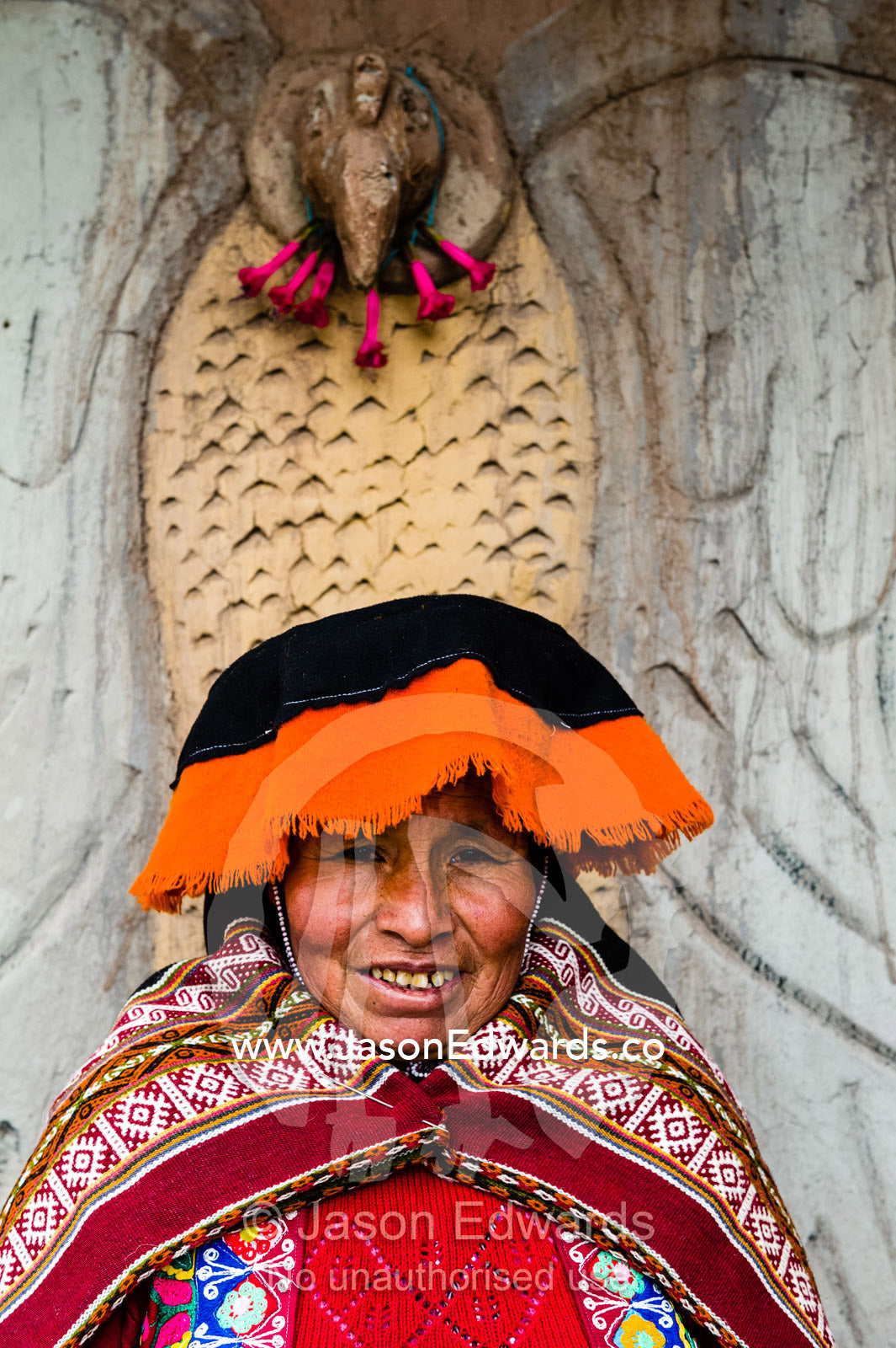 An Amaru woman wears a traditional Lliclla handwoven shoulder cloth fastened with a tupu pin. Peru.
