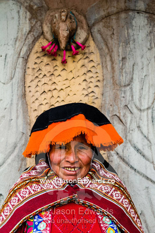 An Amaru woman wears a traditional Lliclla handwoven shoulder cloth fastened with a tupu pin. Peru.