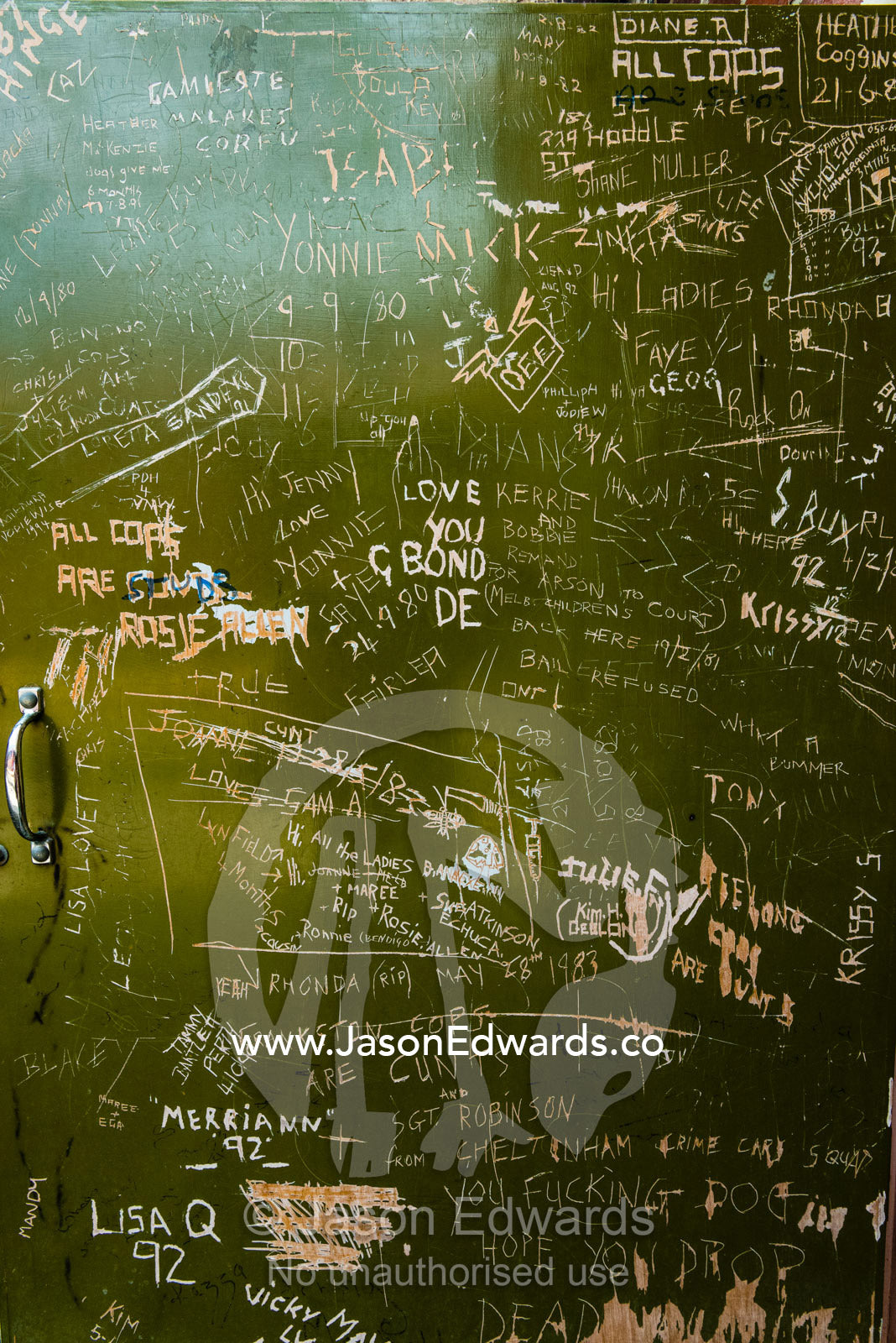 Convict graffiti on a door in a city jail. Melbourne, Victoria, Australia.