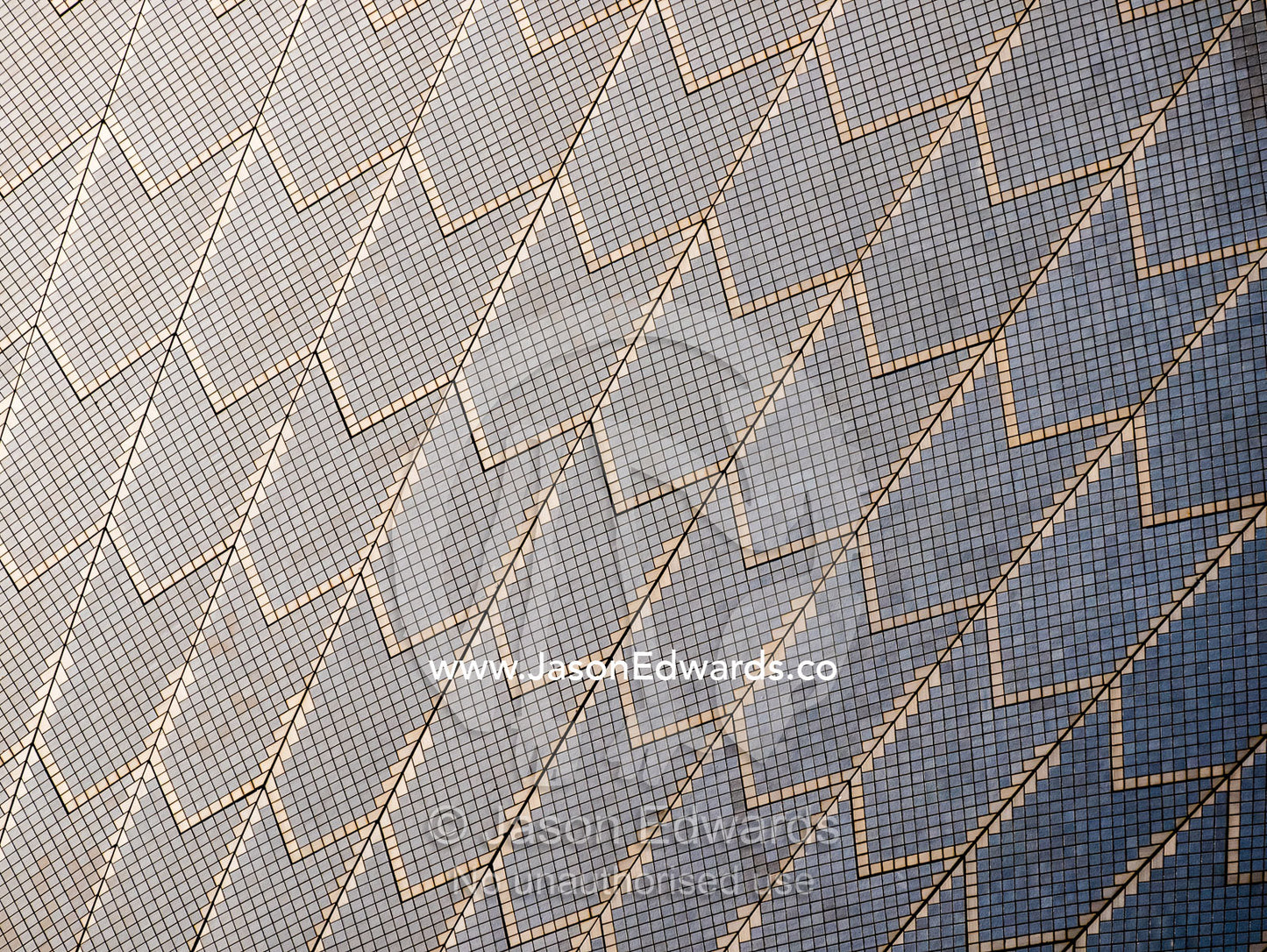 The tiled surface of an arching sail dome on the Sydney Opera House. Sydney, New South Wales, Australia.