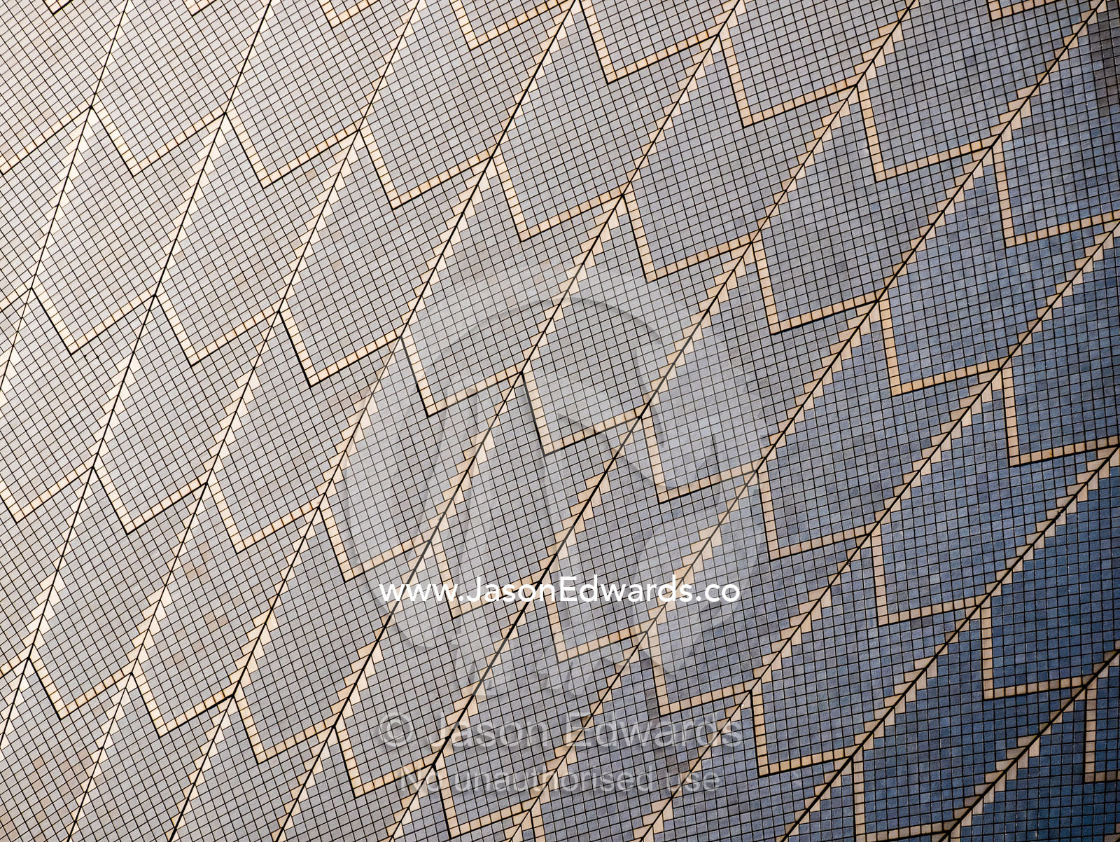 The tiled surface of an arching sail dome on the Sydney Opera House. Sydney, New South Wales, Australia.