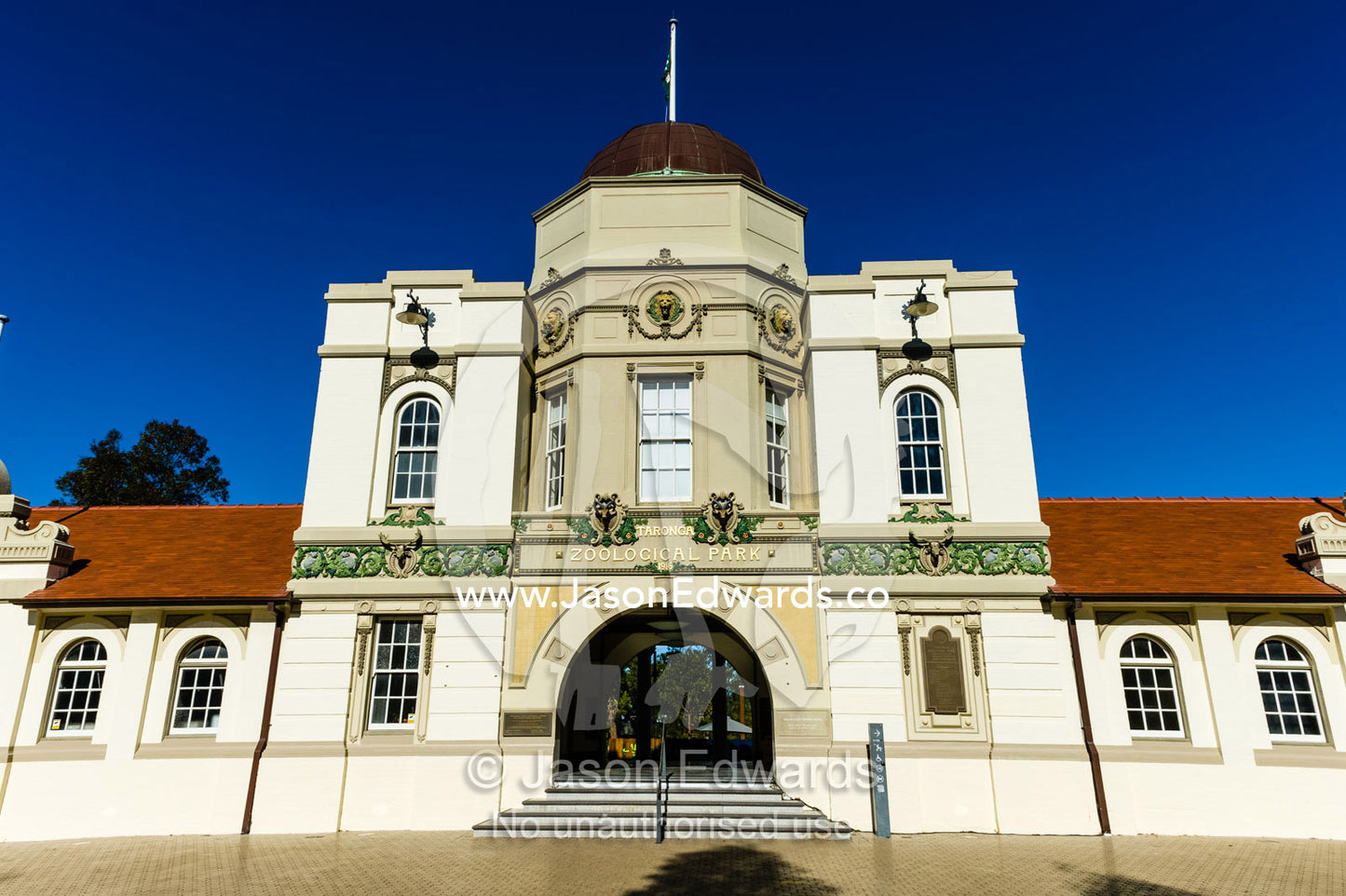 The antique heritage facade of the main entrance to Taronga Zoological Park. Sydney, New South Wales, Australia.