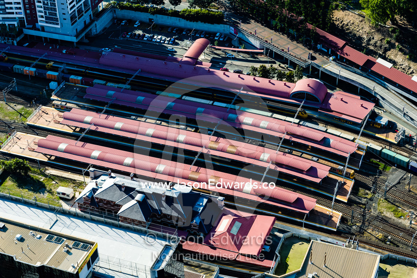 An aerial view of a railway station and train platform verandahs. Brisbane, Queensland, Australia.