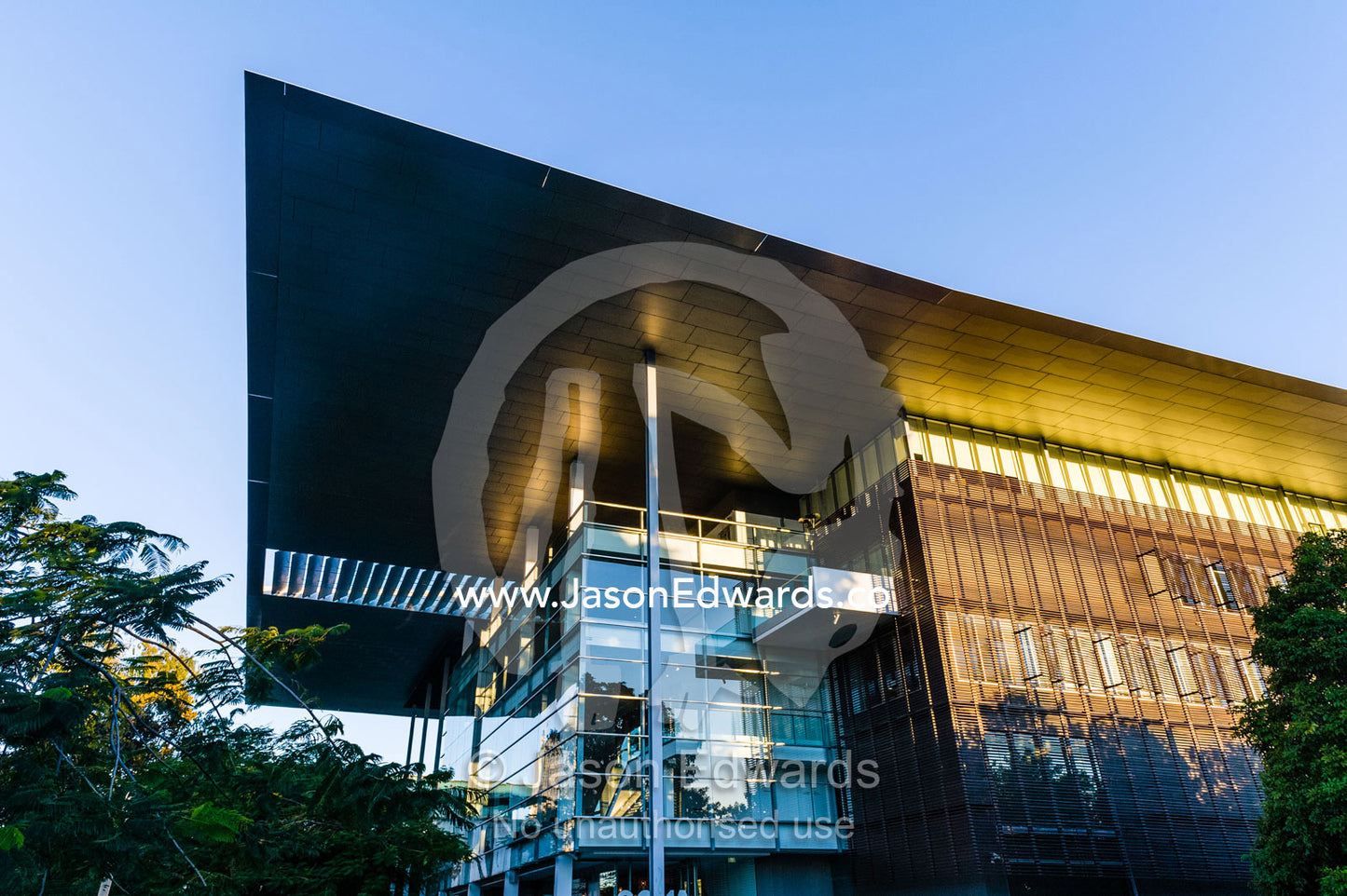 The steel and glass facade of the Queensland Gallery of Modern Art. Brisbane, Queensland, Australia.