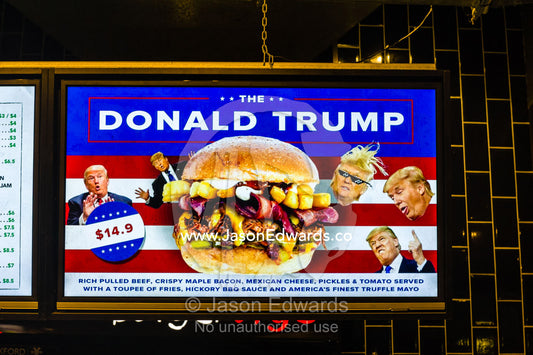 A burger shop advertising a hamburger they named after Donald Trump. Brisbane, Queensland, Australia.
