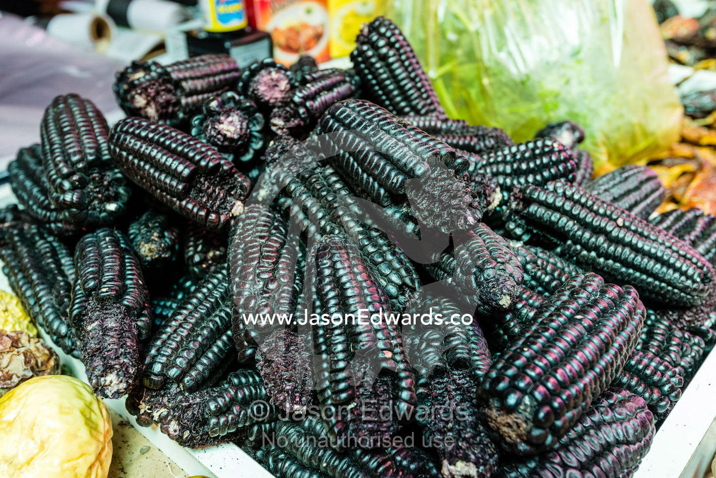 Black Aztec Sweet Corn for sale in a vegetable market. Santiago, Chile.