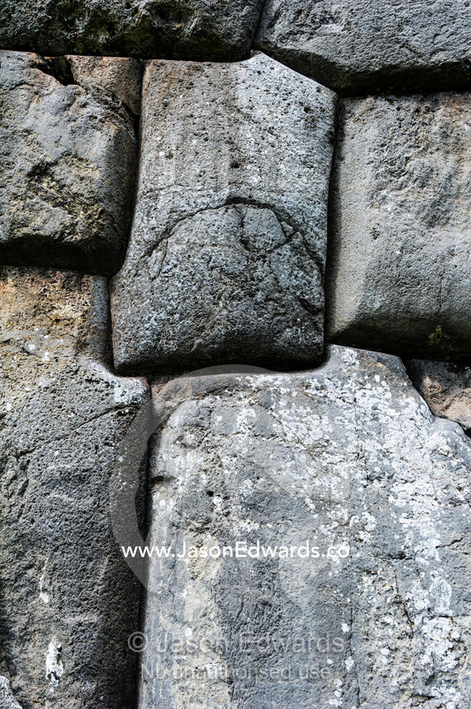 The Inca carved interlocking dry-stone walls from boulders. Cusco, Peru.