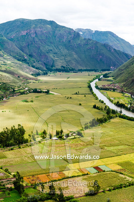 Agricultural farmland in a lush river valley in the Andes. Pisac, Peru.