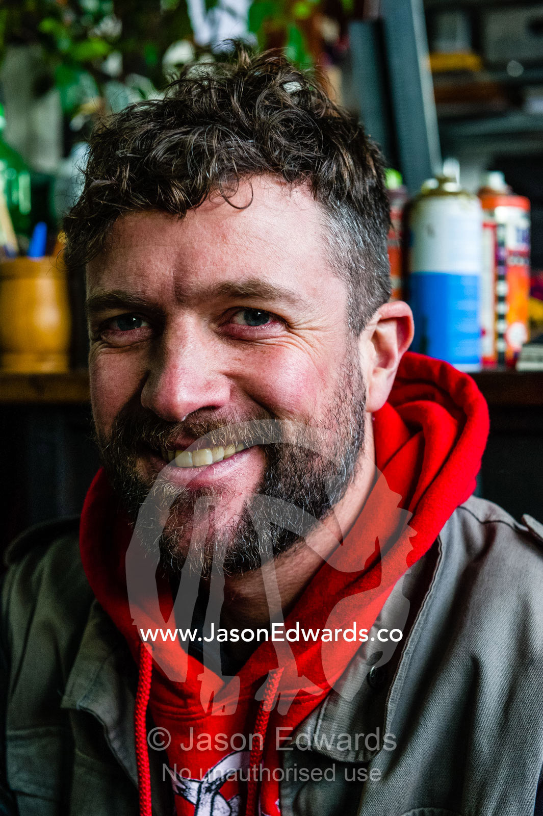 A portrait of a graffiti street artist in his inner city studio. Victoria, Australia.