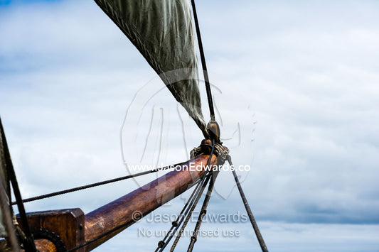 Canvas sail ropes and bow sprit on an antique timber sailing ship. Melbourne, Victoria, Australia.