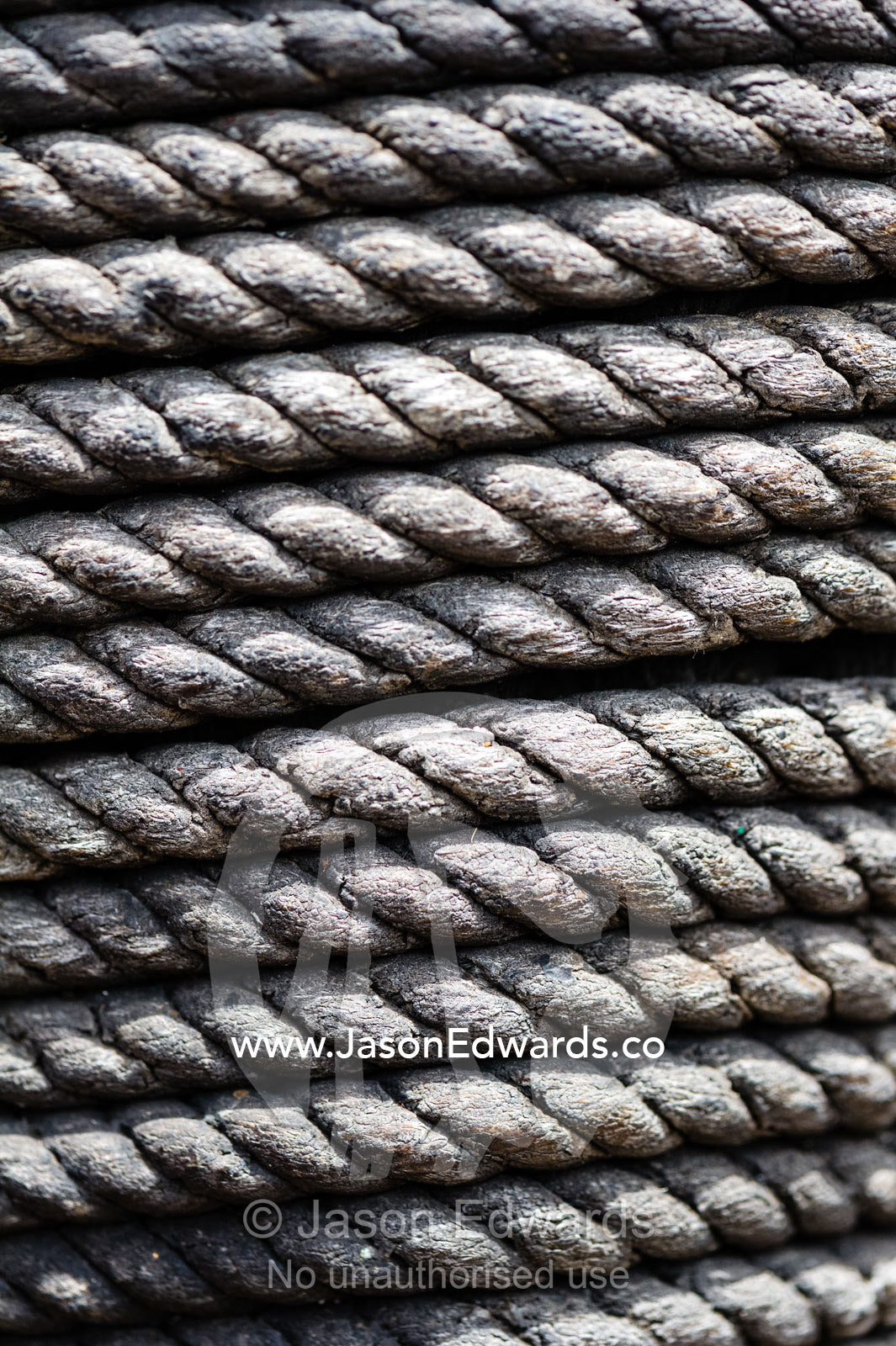 Coils of sail rope around a mast. Melbourne, Victoria, Australia.