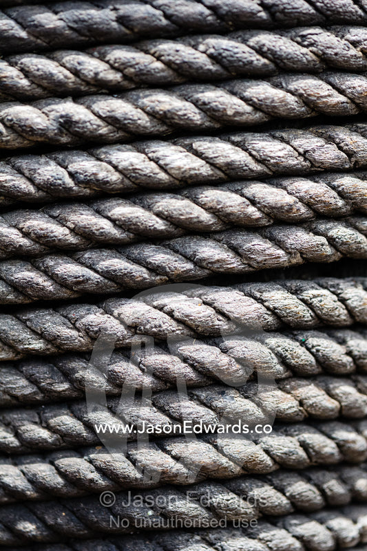 Coils of sail rope around a mast. Melbourne, Victoria, Australia.