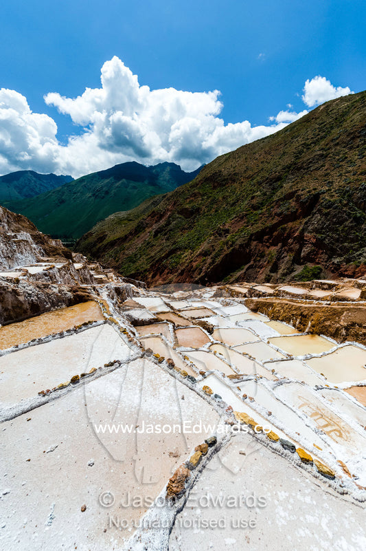 An Inca salt mine made up of salty spring water ponds evaporating. Maras, Peru.