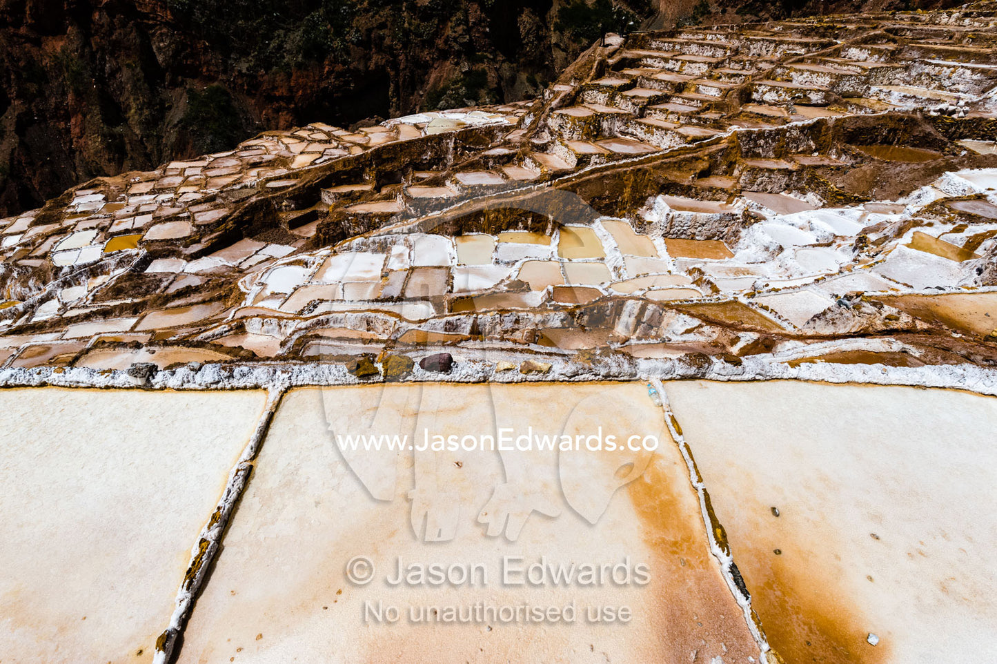 An Inca salt mine made up of salty spring water ponds evaporating. Maras, Peru.