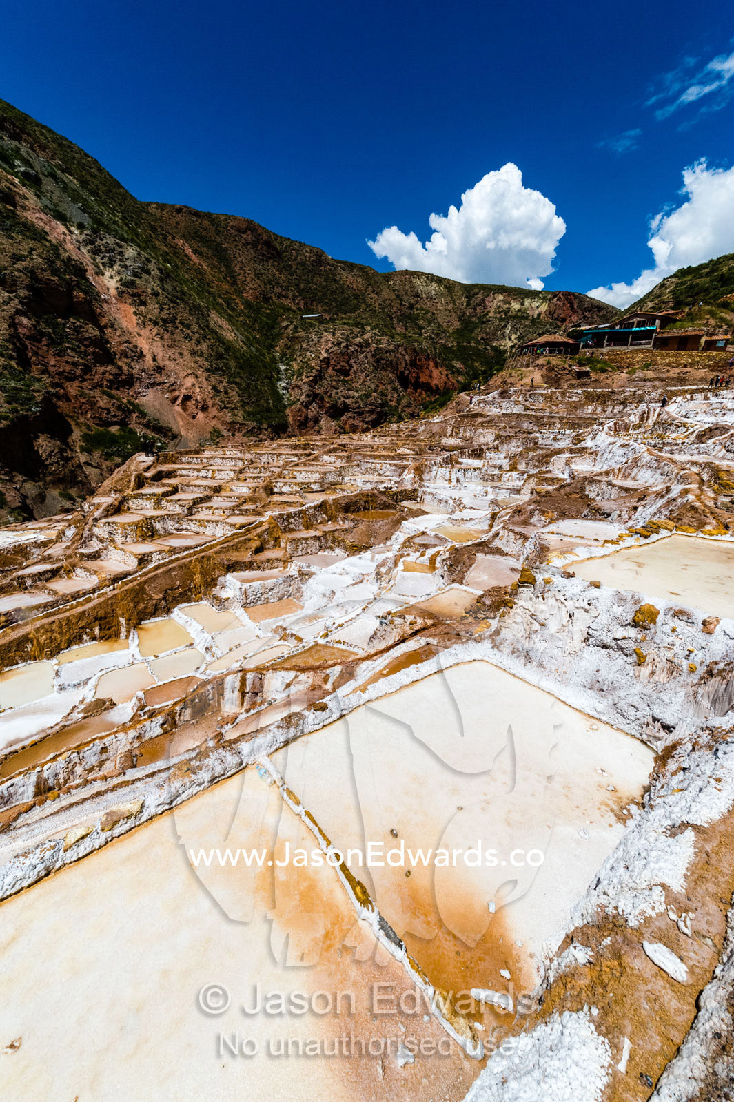 An Inca salt mine made up of salty spring water ponds evaporating. Maras, Peru.