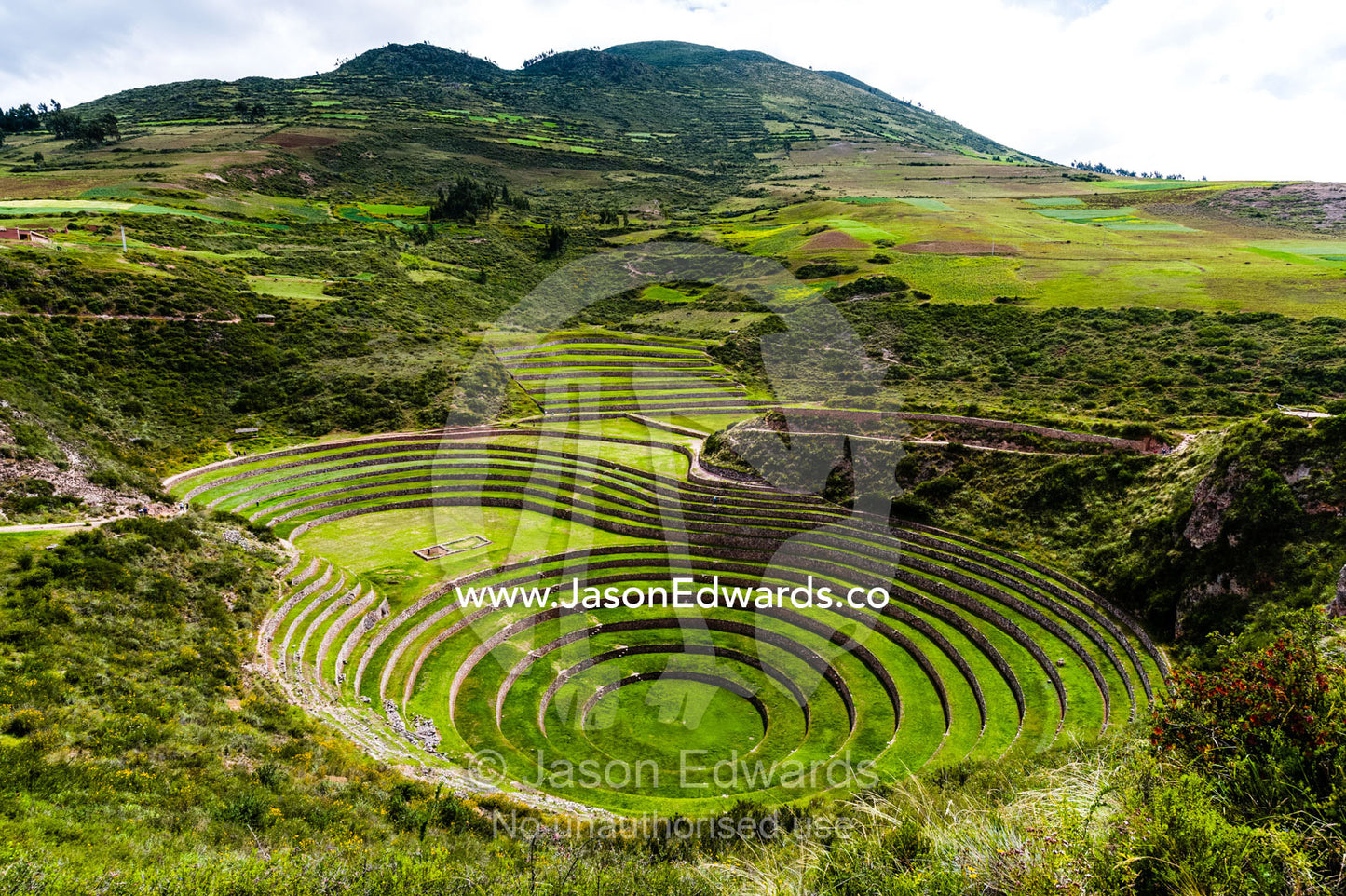 An Inca site with stone wall terraces for growing agricultural crops by creating microclimates. Maras, Peru.