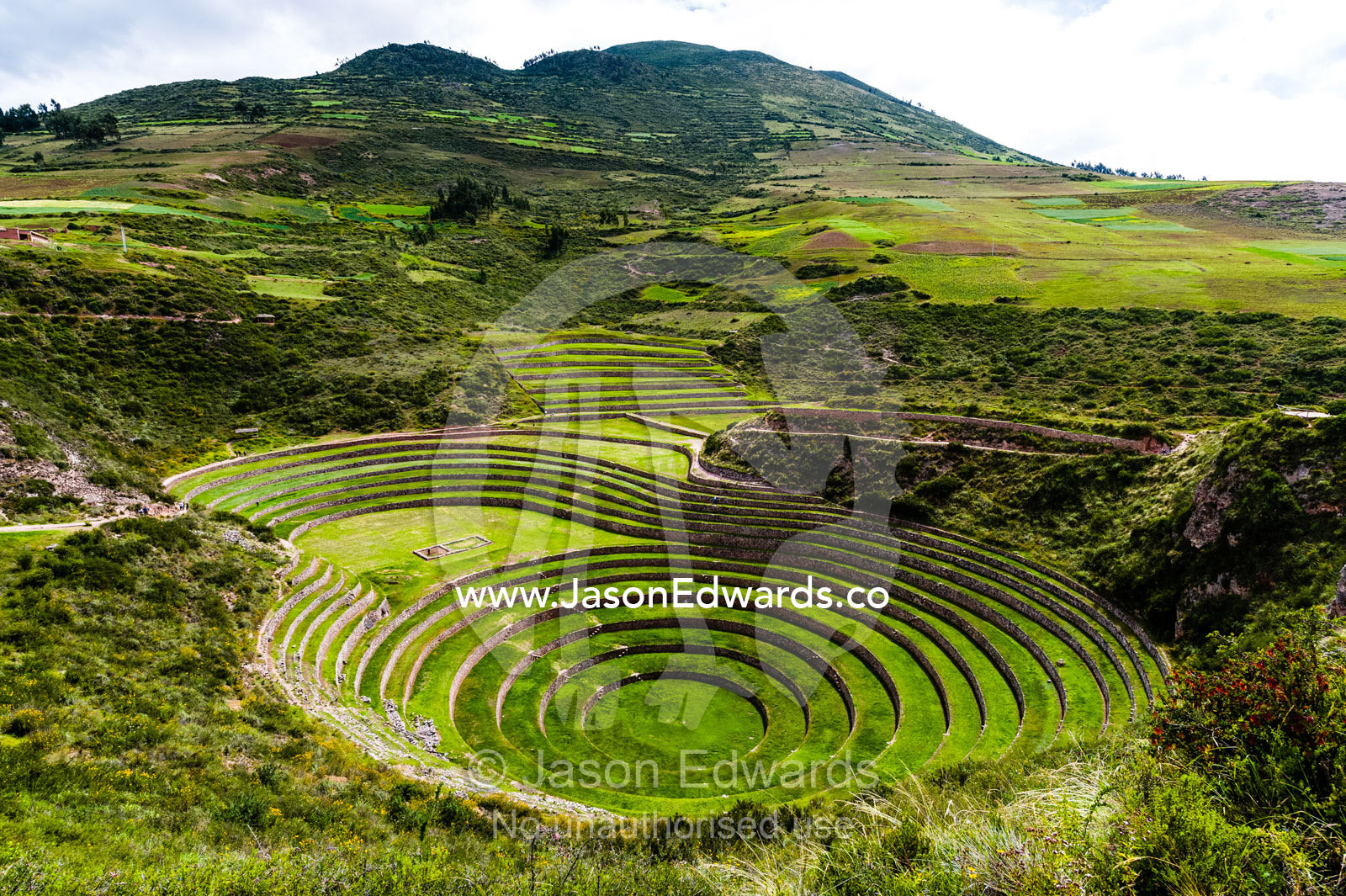 An Inca site with stone wall terraces for growing agricultural crops by creating microclimates. Maras, Peru.
