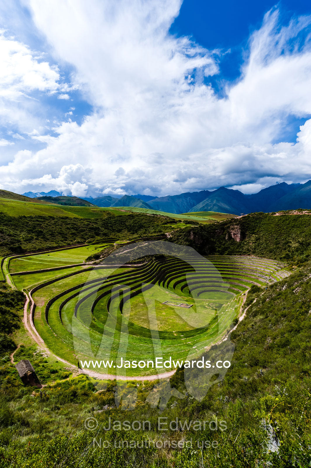 An Inca site with stone wall terraces for growing agricultural crops by creating microclimates. Maras, Peru.