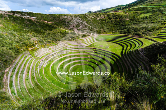An Inca site with stone wall terraces for growing agricultural crops by creating microclimates. Maras, Peru.