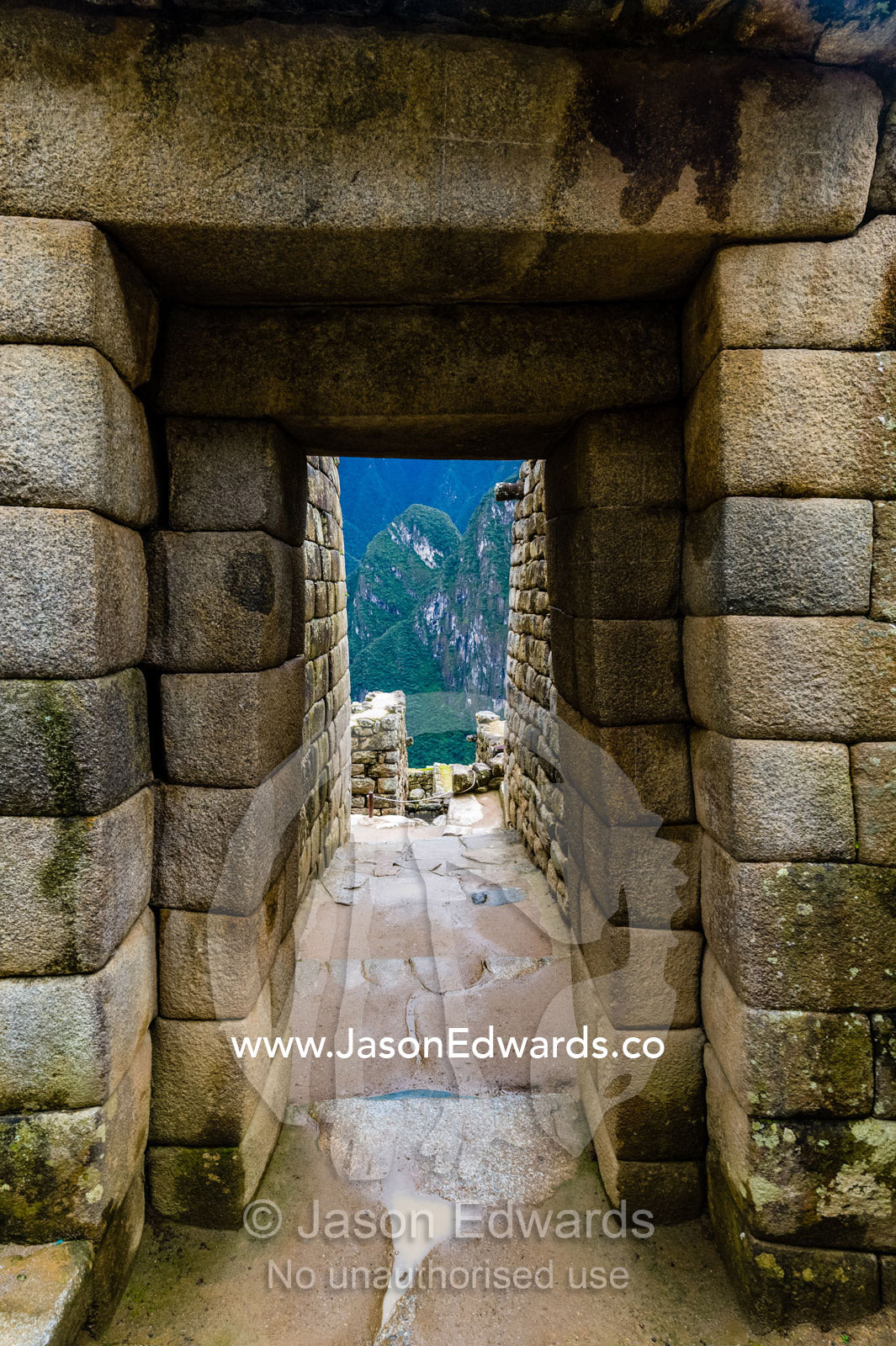 Inca polished dry-stone doorway arch at the Temple of the Sun and Torreon, the observatory. Peru.